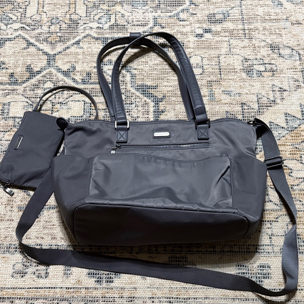 Large travel Baggallini with trolley sleeve and RFID wallet.